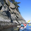 Sea kayaking west side along rocks